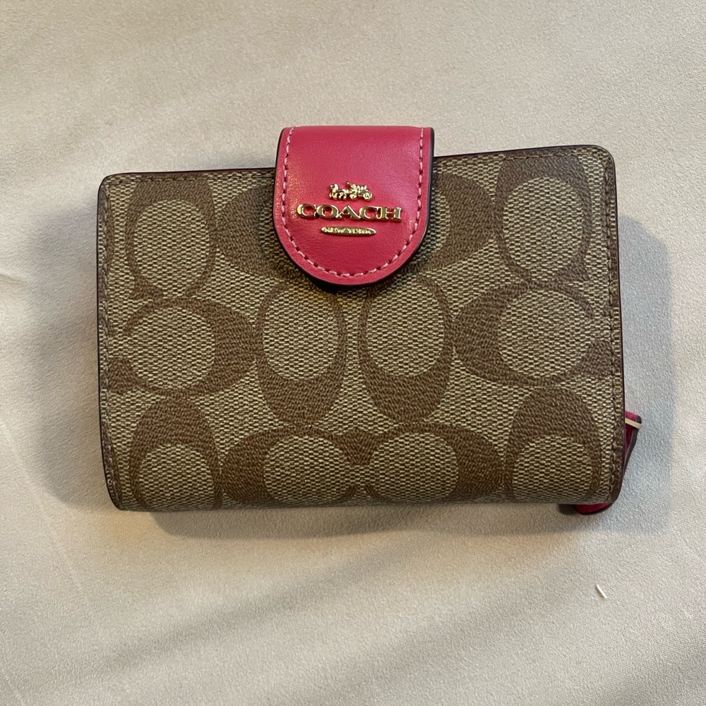 Authentic Coach wallet.